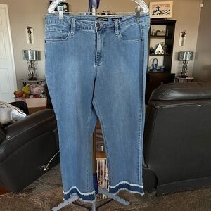 Susan Graver blue stonewashed blue jeans with trim on bottom. Size  16P